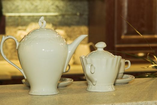 A white ceramic tea set