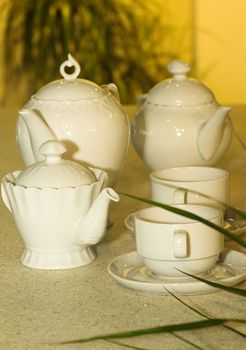 A white ceramic tea set
