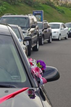 Luxury wedding car decorated with flowers