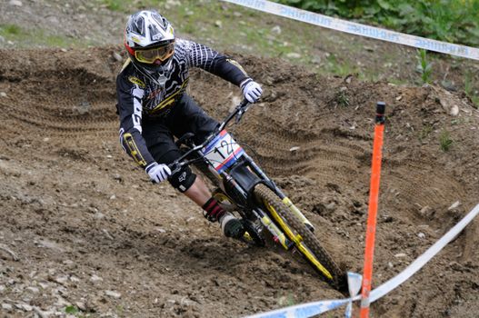 LEOGANG, AUSTRIA - JUN 12: UCI Mountain bike world cup. Marc Beaumont (GBR) at the downhill final race on June 12, 2011 in Leogang, Austria.