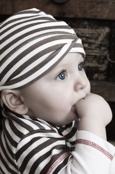 Cute baby boy with big blue eyes