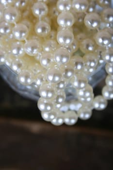 String of pearls in a crystal glass