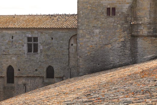 Image of roofs and wall in Carcassonne fortress.Carcassonne is a very famous fortified medieval town located in the Languedoc-Roussillon (Aude department) region in the South of France.