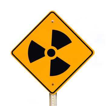 Road sign on pole warning of nuclear radiation isolated on white background.