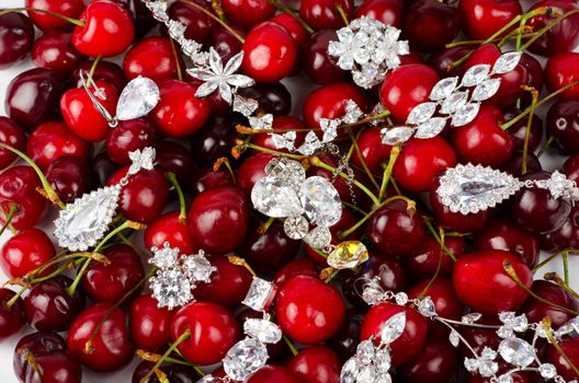 Jewels at fruit red ripe cherries berry background