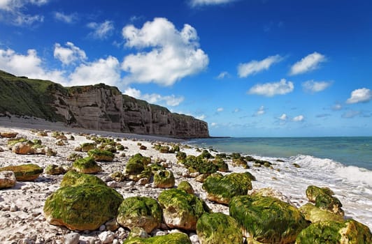 Image of the rocky beach from Le Tileul in the Upper Normandy in the North of France.