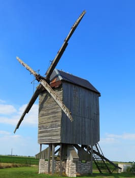 Traditional wooden windmill in France in the Eure &Loir Valley region.This is Saint-Thomas mill.