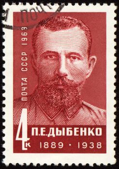 USSR - CIRCA 1969: post stamp printed in USSR shows portrait of russian politician and revolutionary Pavel Dybenko (1889-1938), circa 1969