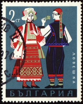 BULGARIA - CIRCA 1968: stamp printed in Bulgaria, shows man and woman in Bulgarian national costumes from Lovech region, series, circa 1968