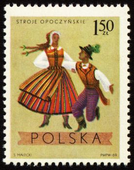 POLAND - CIRCA 1969: A stamp printed in Poland shows polish folk dancers in costumes from Opoczynski region, series, circa 1969