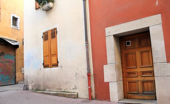 Colored houses in a typically narrow street in the old Annecy, France