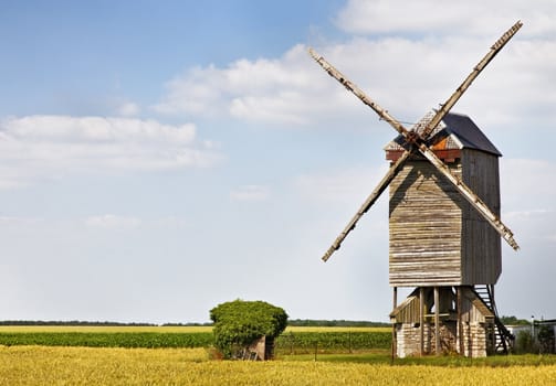 Traditional wooden windmill in France in the Eure &Loir Valley region.This is Saint-Thomas mill.