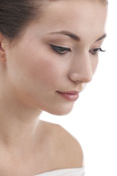 Young womans face with subtle make up and eye lash extensions