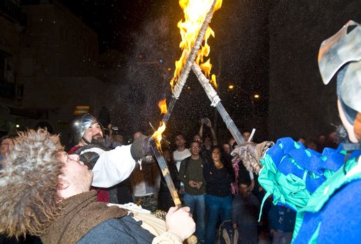 JERUSALEM - NOV 03 : An Italian actors dresses as knight fight with sword and fire in the annual medieval style knight festival held in the old city of Jerusalem on November 03 2011