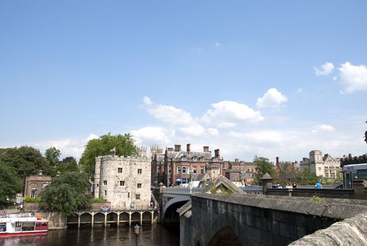 River Ouse Lendal Bridge and Lendal Tower Yorkunder a blue sky