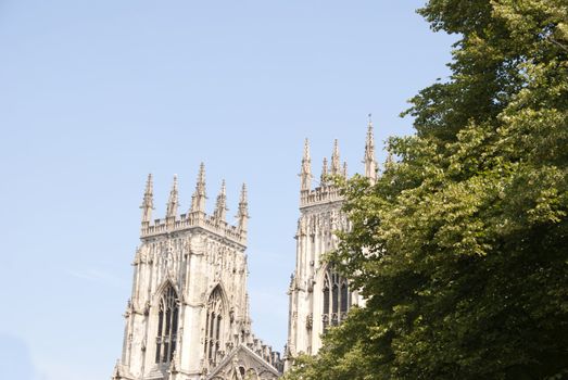 Twin Towers of York Minster under a blue sky