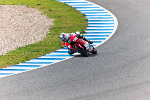 JEREZ DE LA FRONTERA, SPAIN - MAR 5: Moto2 motorcyclist Miguel Oliveira takes a curve in the MotoGP Official Trainnig on Mar 5, 2011 in Jerez de la Frontera, Spain