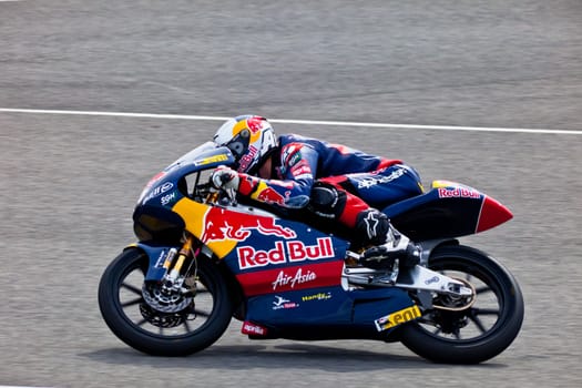 JEREZ DE LA FRONTERA, SPAIN - MAR 5:125cc pilot Jonas Folger races on the official training of the world championship of MotoGP on Mar 5, 2011, in Jerez de la Frontera, Spain