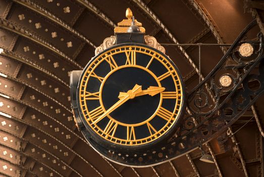 An Antique Black and Gold Railway Station Clock