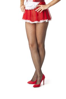 Sexy maid woman legs in fishnet stocking posing