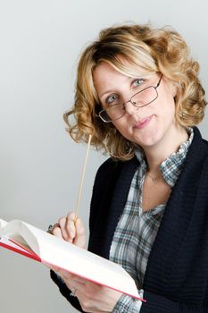 blonde girl with book