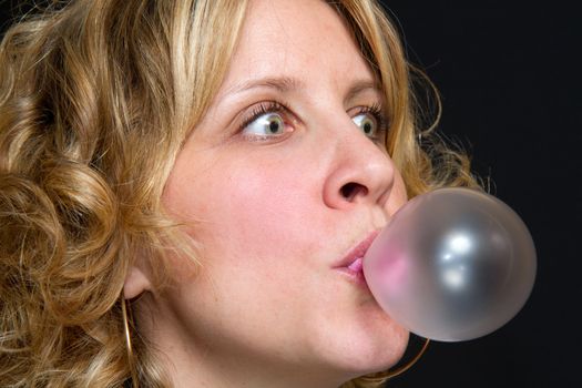 blond girl with bubble gum