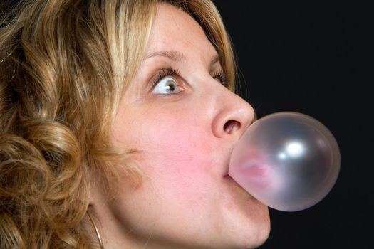 blond girl with bubble gum