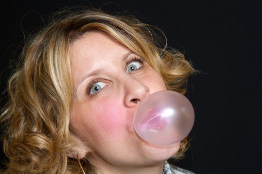 blond girl with bubble gum