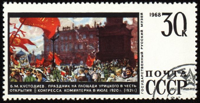 USSR - CIRCA 1968: A stamp printed in the USSR shows picture "Celebration on Uritsky Square in honor of the opening of II Congress of the Comintern in July 1920" by Boris Kustodiev, circa 1968