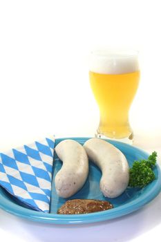 veal sausage with sweet mustard on a white background