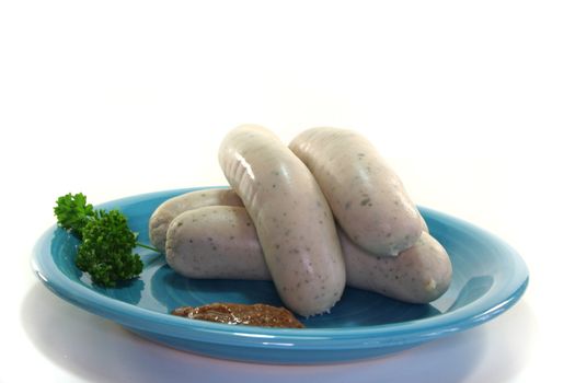 veal sausage with sweet mustard on a white background