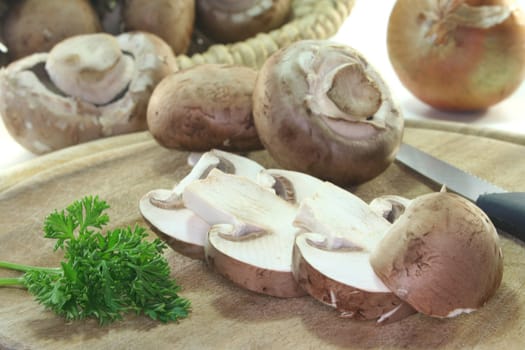 fresh mushrooms with parsley on white background