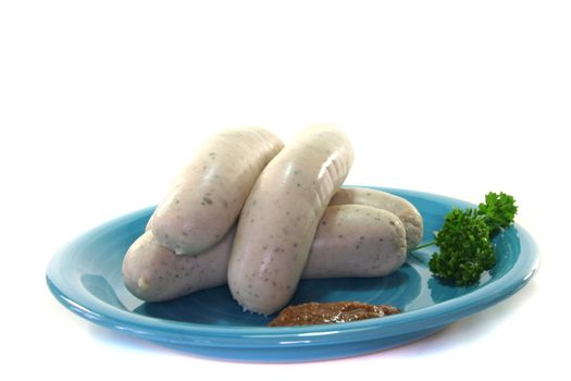 veal sausage with sweet mustard on a white background