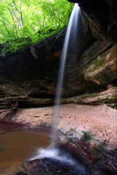 Water flows over beautiful Owl Canyon Falls at Starved Rock State Park of Illinois.