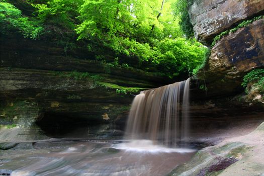 Lasalle Falls cuts through a canyon at Starved Rock State Park in central Illinois.
