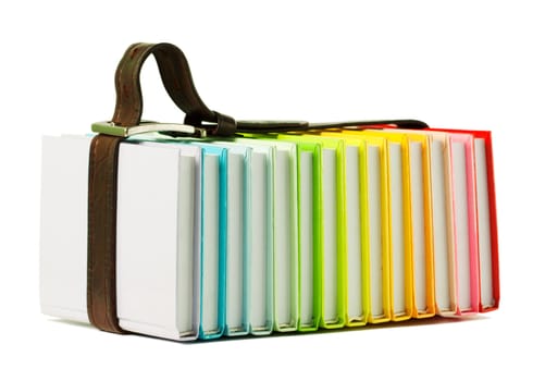 Stack of colorful books on the white background