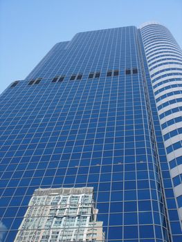 Modern blue building with a reflect in it in Toronto, Canada