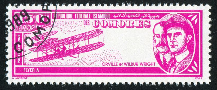 COMORO ISLANDS - CIRCA 1988: stamp printed by Comoro islands, shows airplane and Wright Brothers, circa 1988
