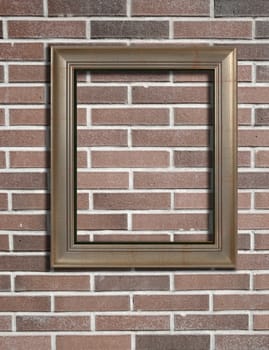Blank photo frame on old brick wall.
