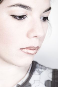 Studio portrait of a beauty model looking down