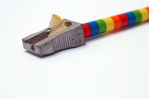 sharpen a coloured pencil with shavings