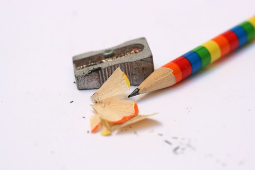 coloured pencil and sharpener with shavings