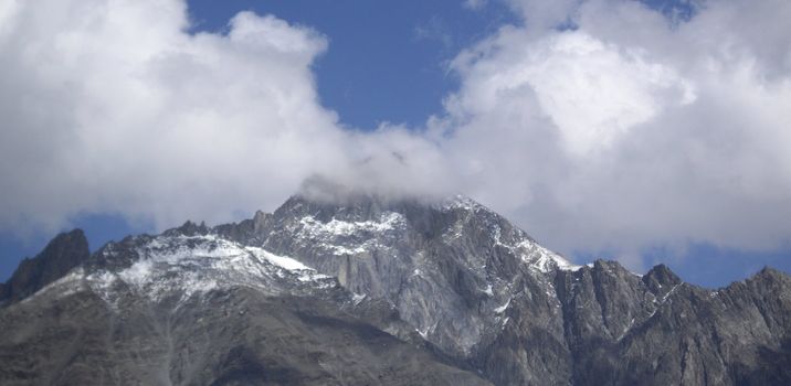 the snow on the mountain peak in Caucasus region