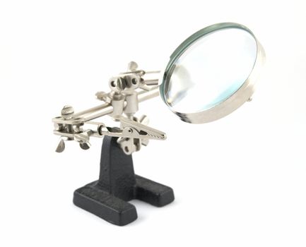 Clip with a magnifier for work with radio-electronic devices