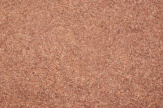 textured material: coseup of tennis court surface
