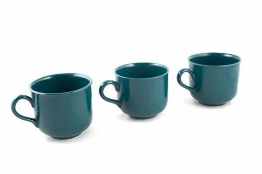 Green cups on a white background