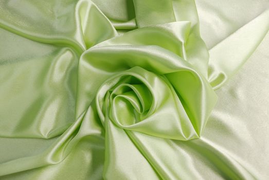 Green satin with a folds