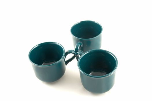 Green cups on a white background