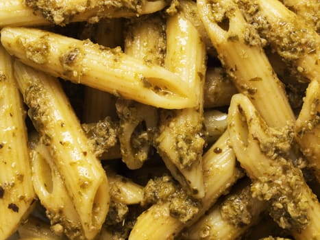 penne pasta in pesto sauce food background