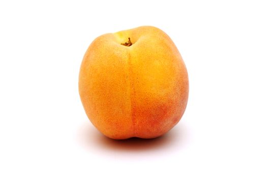 Foto of  one peach placed on white background